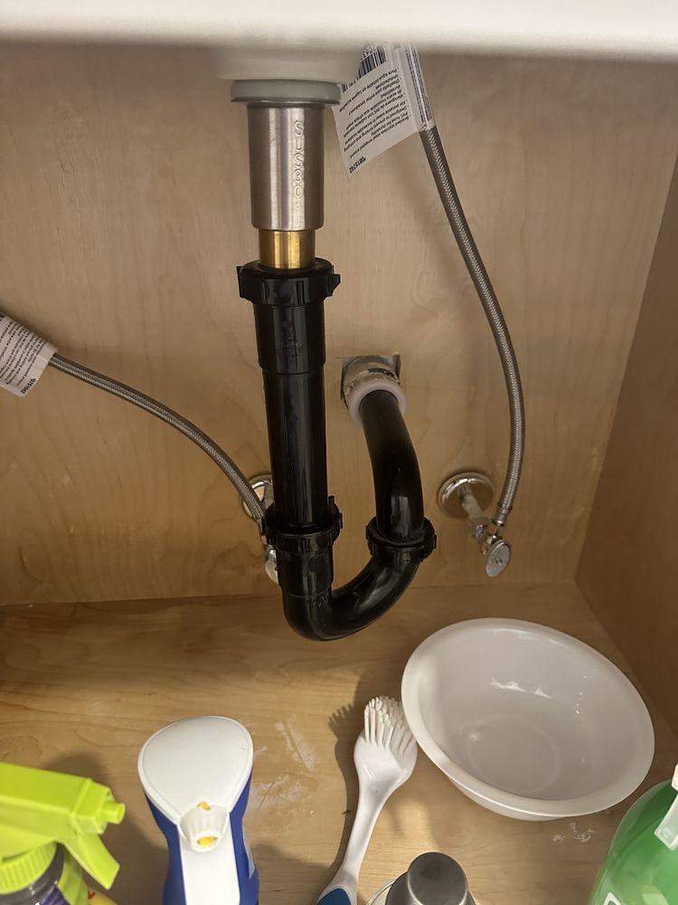 a black kitchen pipe