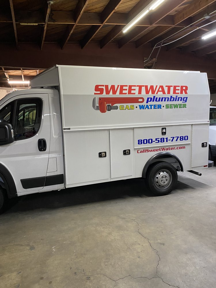 A picture of a plumbing service van