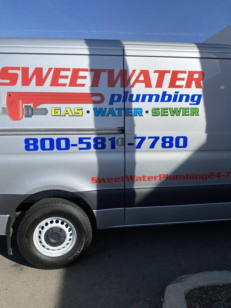 A photo showing Sweetwater Plumbing’s van parked in a parking lot.