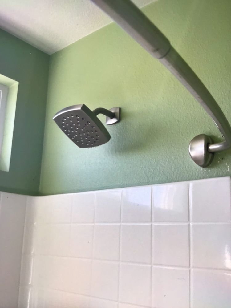 A new showerhead installed by plumbers in Rancho Cucamonga
