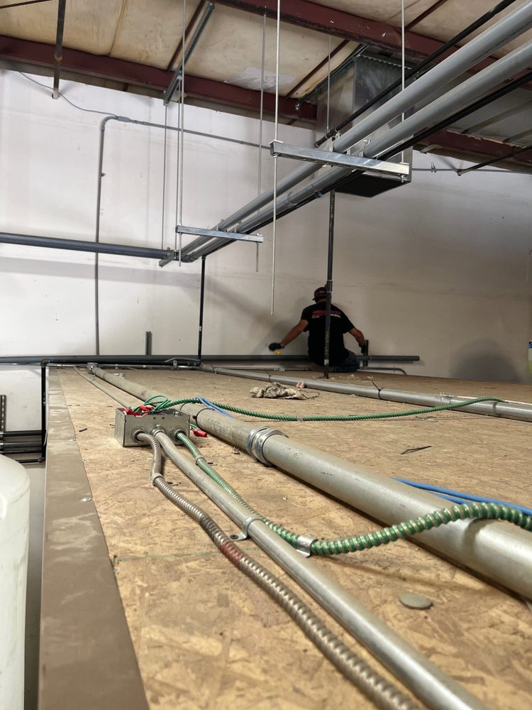 Pipes in a room getting sewer line repair in Upland