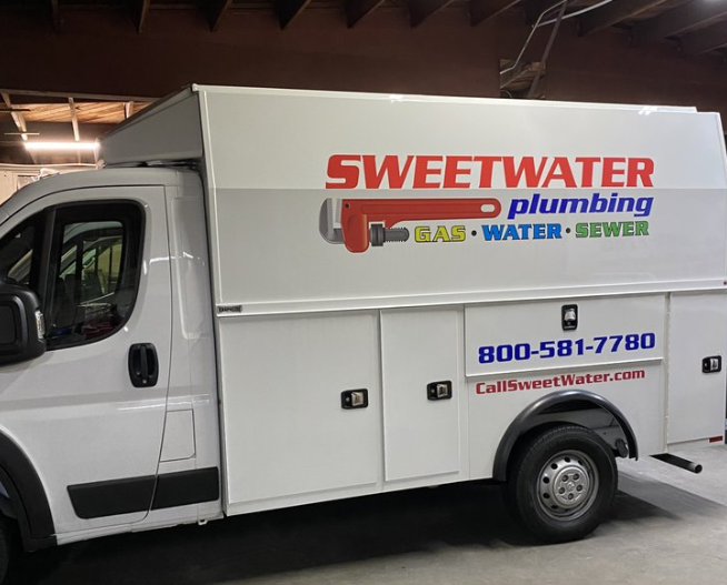 A Sweetwater Plumbing van outside a Rancho Cucamonga home for water heater replacement service.