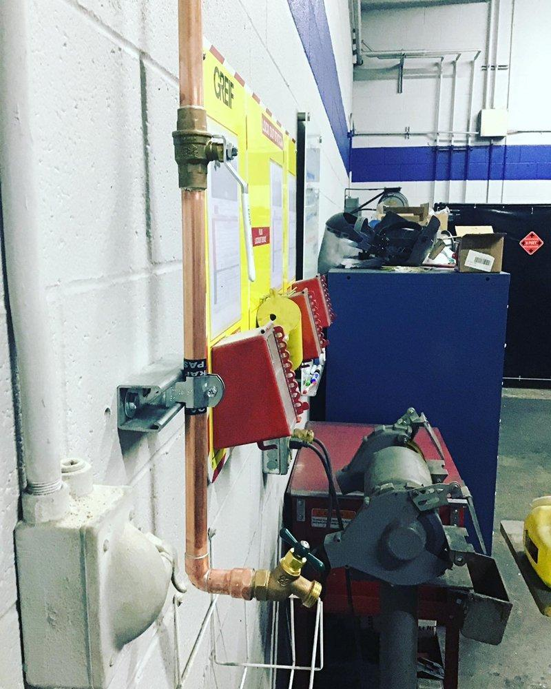 A plumbing system running through building.
