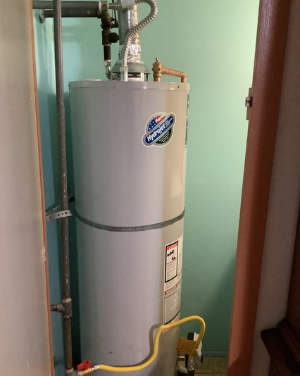 New water heater installed in an older home.