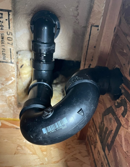 Water leaking from a pipe.