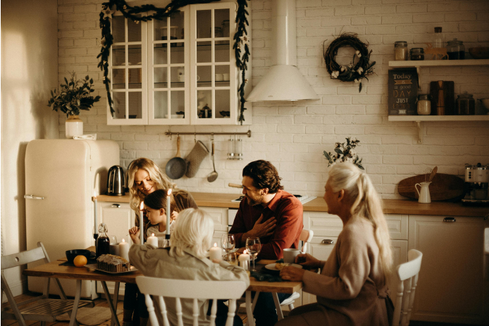 A family gathering in the kitchen before the holidays.